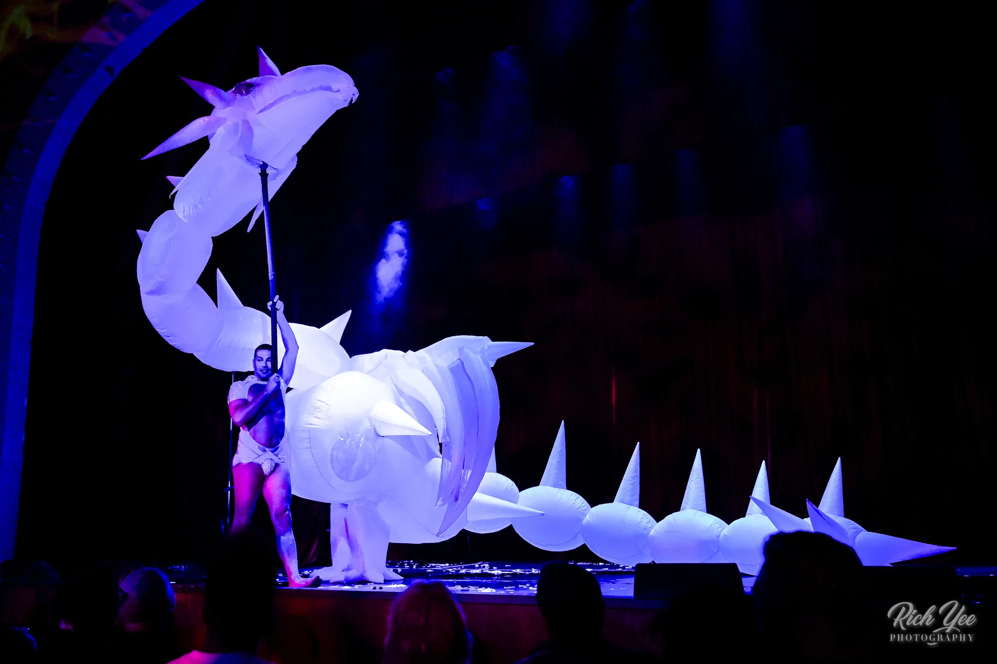 Large inflatable dragon puppet on stage